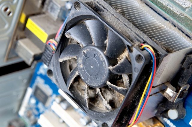 Power off your computer and unplug all external devices.
Clean the dust from the CPU and other components using compressed air.